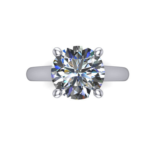 Madilyn round solitaire engagement ring in 14K White Gold, top-down view showing the brilliant round center diamond held by four prongs above the plain band