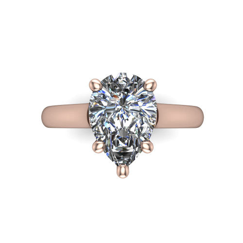 Madilyn pear solitaire engagement ring in 18K Rose Gold, top-down view showing the brilliant pear-cut center diamond held by four prongs above the plain band