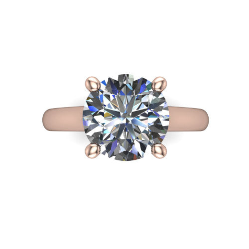 Madilyn round solitaire engagement ring in 14K Rose Gold, top-down view showing the brilliant round center diamond held by four prongs above the plain band
