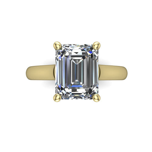 Madilyn emerald solitaire engagement ring in 18K Yellow Gold, top-down view showing the step-cut emerald center diamond held by four prongs above the plain band