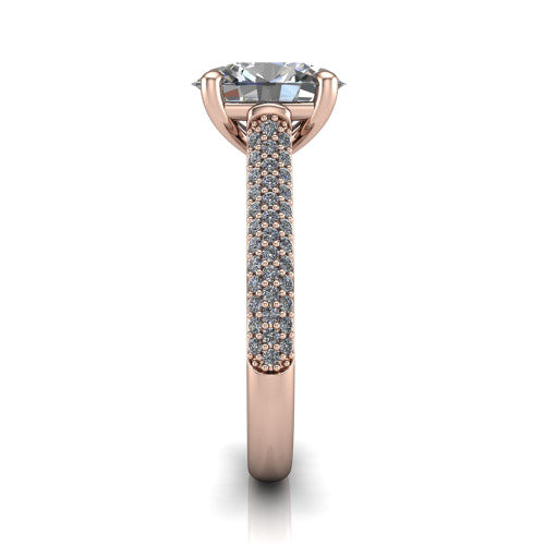 Izabella oval solitaire engagement ring in 14K Rose Gold, side profile showing the 3-sided micropave diamonds wrapping the top and outer sides of the shank