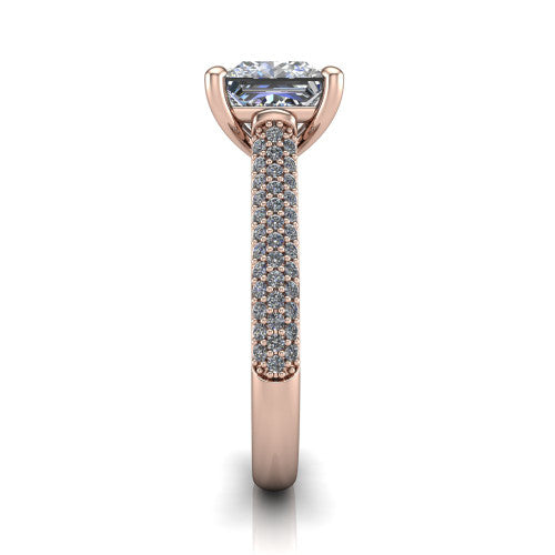Izabella princess solitaire engagement ring in 14K Rose Gold, side profile showing the 3-sided micropave diamonds wrapping the top and outer sides of the shank