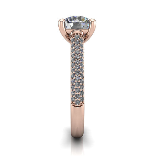 Izabella round solitaire engagement ring in 14K Rose Gold, side profile showing the 3-sided micropave diamonds wrapping the top and outer sides of the shank