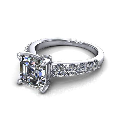 Nina square emerald solitaire engagement ring in 14K White Gold, three-quarter perspective showing the step-cut square emerald center diamond on a pave-accent shank with a hidden under-halo beneath the center stone