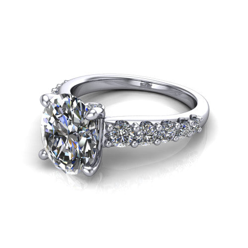 Nina oval solitaire engagement ring in 14K White Gold, three-quarter perspective showing the brilliant oval center diamond on a pave-accent shank with a hidden under-halo beneath the center stone