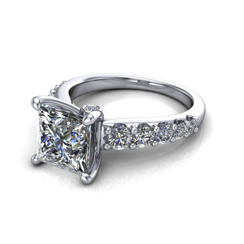 Nina princess solitaire engagement ring in 14K White Gold, three-quarter perspective showing the brilliant princess-cut center diamond on a pave-accent shank with a hidden under-halo beneath the center stone