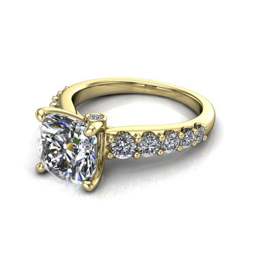 Nina cushion solitaire engagement ring in 14K Yellow Gold, three-quarter perspective showing the brilliant cushion-cut center diamond on a pave-accent shank with a hidden under-halo beneath the center stone