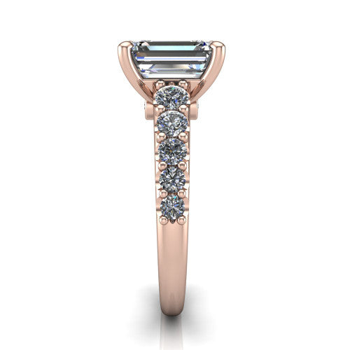Nina emerald solitaire engagement ring in 14K Rose Gold, side profile showing the hidden under-halo beneath the center stone and pave diamonds along the shoulders