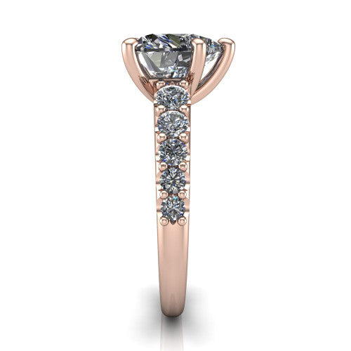 Nina heart solitaire engagement ring in 18K Rose Gold, side profile showing the hidden under-halo beneath the center stone and pave diamonds along the shoulders