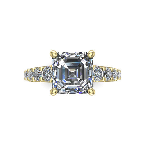 Nina square emerald solitaire engagement ring in 14K Yellow Gold, top-down view showing the step-cut square emerald center diamond held by four prongs above the pave shoulder accents