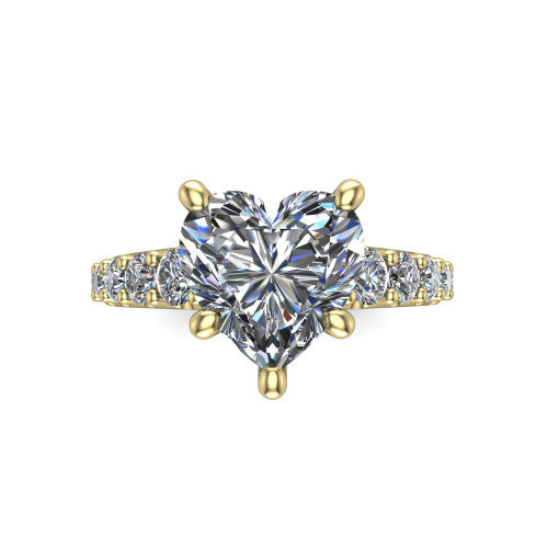 Nina heart solitaire engagement ring in 14K Yellow Gold, top-down view showing the brilliant heart-shaped center diamond held by four prongs above the pave shoulder accents