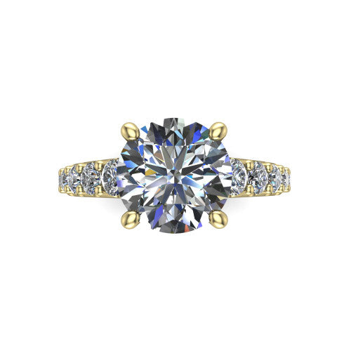 Nina round solitaire engagement ring in 14K Yellow Gold, top-down view showing the brilliant round center diamond held by four prongs above the pave shoulder accents