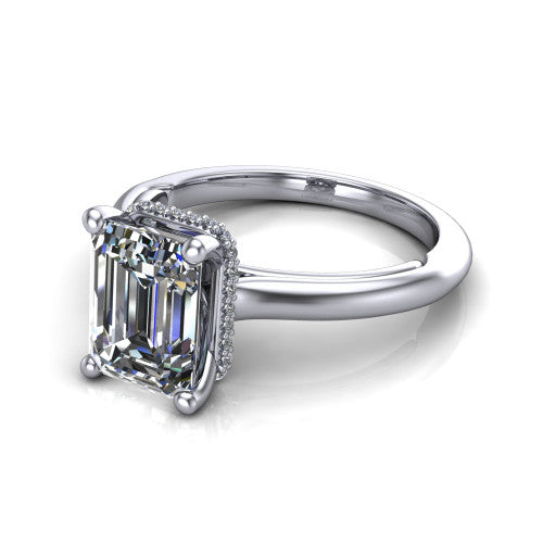 Jocelyn emerald hidden halo engagement ring in 14K White Gold, three-quarter perspective showing the emerald center diamond above a polished band