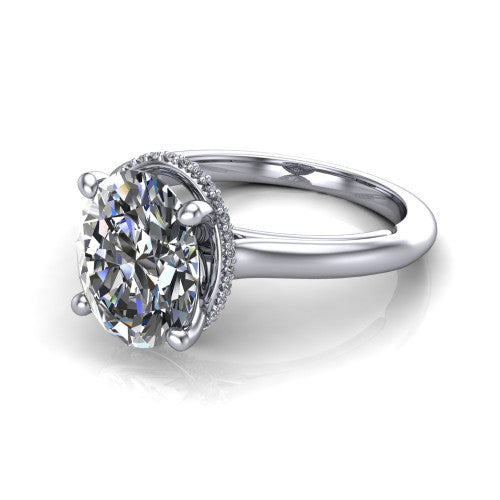 Jocelyn oval hidden halo engagement ring in 18K White Gold, three-quarter perspective showing the oval center diamond above a polished band