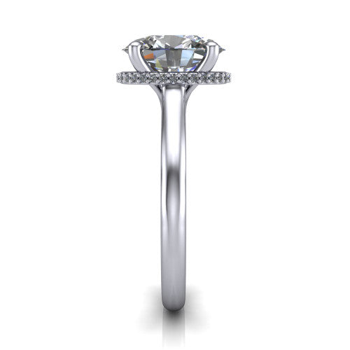 Jocelyn oval hidden halo engagement ring in 18K White Gold, side profile showing the hidden halo beneath the basket