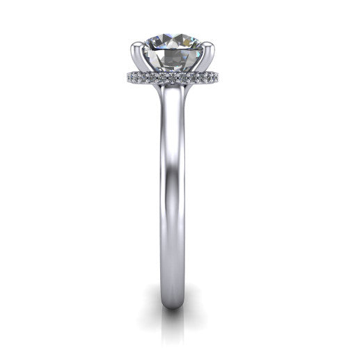 Jocelyn round hidden halo engagement ring in 18K White Gold, side profile showing the hidden halo beneath the basket