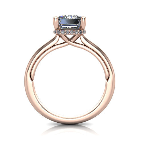 Jocelyn emerald hidden halo engagement ring in 14K Rose Gold, through-finger front profile showing the concealed pave halo
