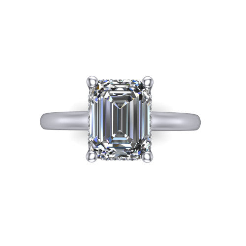 Jocelyn emerald hidden halo engagement ring in Platinum, top-down view showing the four-prong emerald center diamond