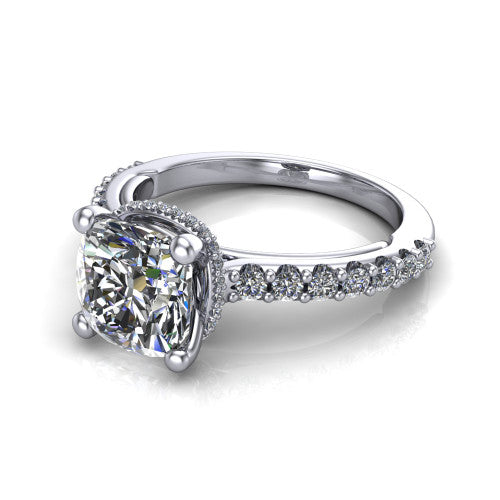 Nadia cushion hidden halo engagement ring in Platinum, three-quarter perspective showing the brilliant cushion-cut center diamond with a hidden pave halo beneath the center stone on a pave eternity band