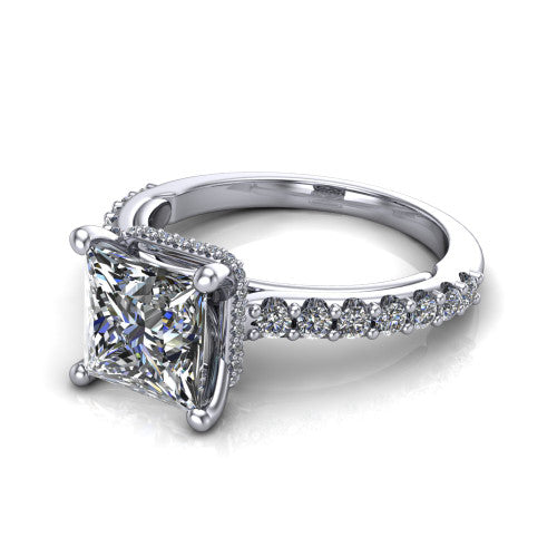 Nadia princess halo engagement ring in 18K White Gold, three-quarter perspective showing the brilliant princess-cut center diamond with a pave halo around the center stone on a pave eternity band