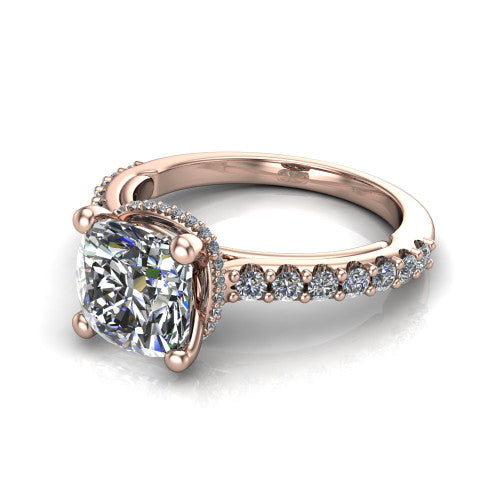 Nadia cushion hidden halo engagement ring in 18K Rose Gold, three-quarter perspective showing the brilliant cushion-cut center diamond with a hidden pave halo beneath the center stone on a pave eternity band