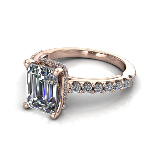 Nadia emerald hidden halo engagement ring in 14K Rose Gold, three-quarter perspective showing the step-cut emerald center diamond with a hidden pave halo beneath the center stone on a pave eternity band