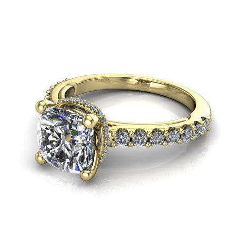 Nadia cushion hidden halo engagement ring in 18K Yellow Gold, three-quarter perspective showing the brilliant cushion-cut center diamond with a hidden pave halo beneath the center stone on a pave eternity band
