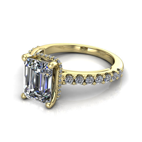Nadia emerald hidden halo engagement ring in 14K Yellow Gold, three-quarter perspective showing the step-cut emerald center diamond with a hidden pave halo beneath the center stone on a pave eternity band