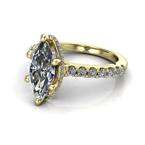 Nadia marquise hidden halo engagement ring in 18K Yellow Gold, three-quarter perspective showing the brilliant marquise center diamond with a hidden pave halo beneath the center stone on a pave eternity band