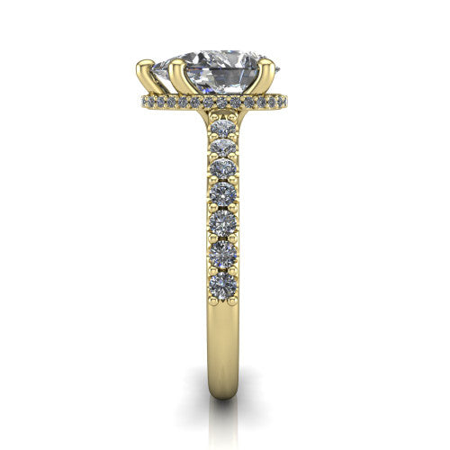Nadia pear hidden halo engagement ring in 18K Yellow Gold, side profile showing the hidden pave halo under the center stone and pave diamonds running continuously around the shank