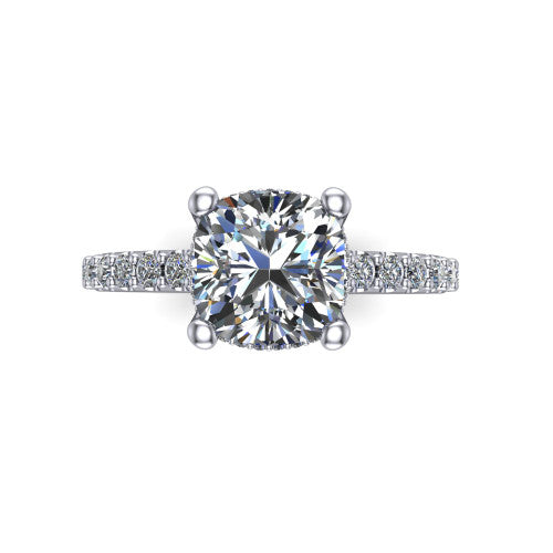 Nadia cushion hidden halo engagement ring in 18K White Gold, top-down view showing the brilliant cushion-cut center diamond with the hidden pave halo peeking from beneath