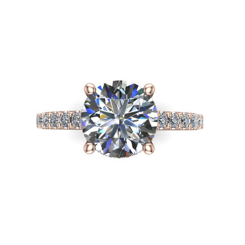 Nadia round hidden halo engagement ring in 18K Rose Gold, top-down view showing the brilliant round center diamond with the hidden pave halo peeking from beneath