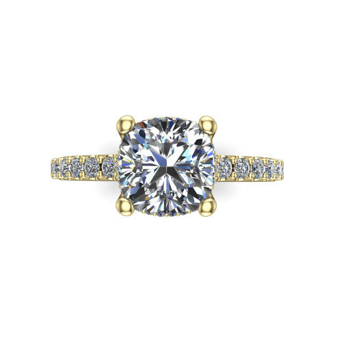 Nadia cushion hidden halo engagement ring in 14K Yellow Gold, top-down view showing the brilliant cushion-cut center diamond with the hidden pave halo peeking from beneath