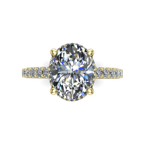 Nadia oval hidden halo engagement ring in 14K Yellow Gold, top-down view showing the brilliant oval center diamond with the hidden pave halo peeking from beneath