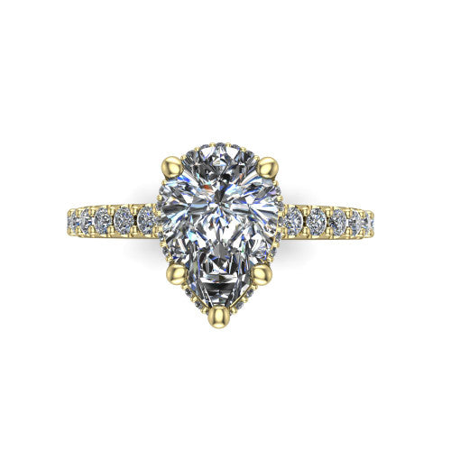 Nadia pear hidden halo engagement ring in 18K Yellow Gold, top-down view showing the brilliant pear-cut center diamond with the hidden pave halo peeking from beneath