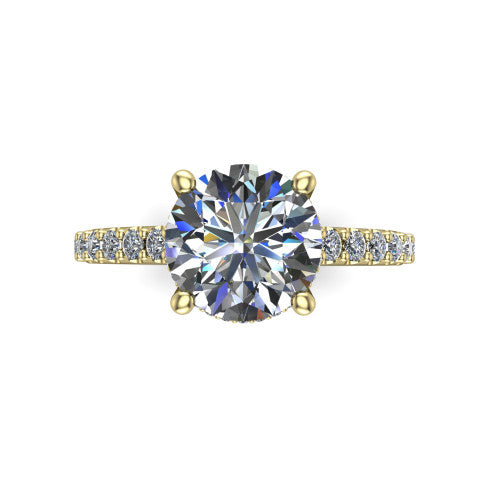 Nadia round hidden halo engagement ring in 14K Yellow Gold, top-down view showing the brilliant round center diamond with the hidden pave halo peeking from beneath