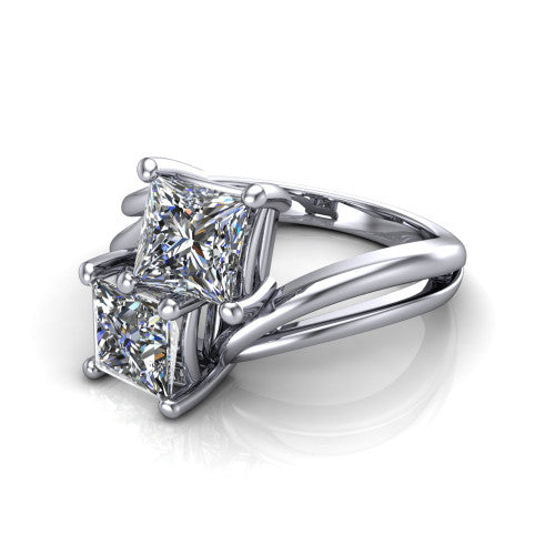 Lexi princess three stone engagement ring in 18K White Gold, three-quarter perspective showing two brilliant princess-cut diamonds set diagonally on a bypass split shank with plain bands