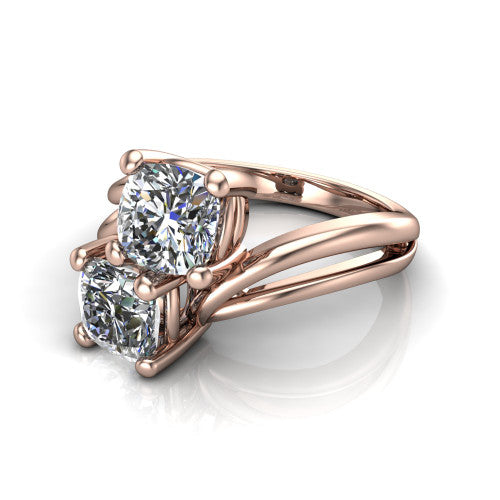 Lexi cushion three stone engagement ring in 18K Rose Gold, three-quarter perspective showing two brilliant cushion-cut diamonds set diagonally on a bypass split shank with plain bands