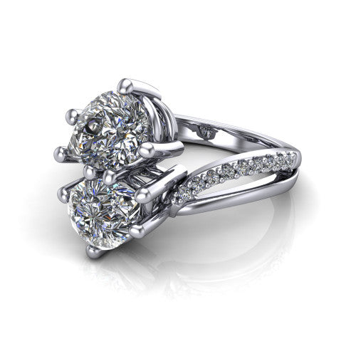 Julieta pear three stone engagement ring in 14K White Gold, three-quarter perspective showing two brilliant pear-cut diamonds set diagonally on a bypass split shank with pave diamonds
