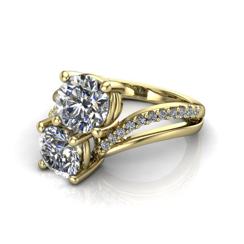 Julieta round three stone engagement ring in 14K Yellow Gold, three-quarter perspective showing two brilliant round diamonds set diagonally on a bypass split shank with pave diamonds