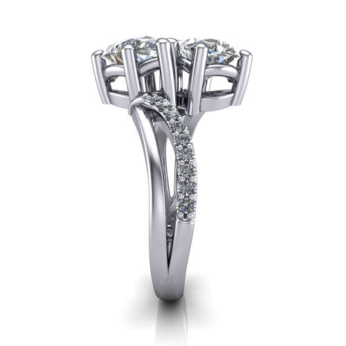 Julieta pear three stone engagement ring in Platinum, side profile showing the bypass split shank arms with pave diamonds running along both bands
