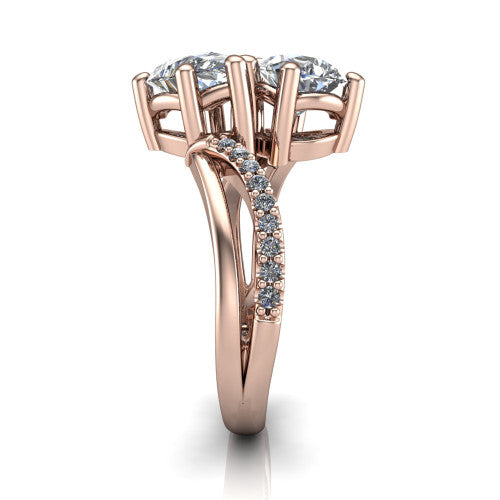 Julieta pear three stone engagement ring in 18K Rose Gold, side profile showing the bypass split shank arms with pave diamonds running along both bands