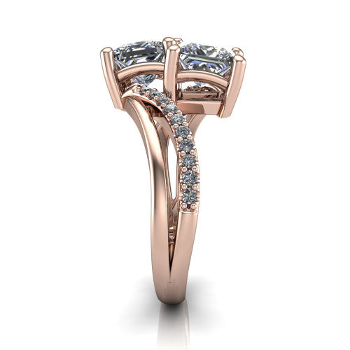 Julieta princess three stone engagement ring in 18K Rose Gold, side profile showing the bypass split shank arms with pave diamonds running along both bands