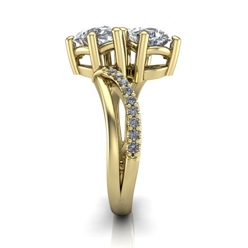 Julieta pear three stone engagement ring in 18K Yellow Gold, side profile showing the bypass split shank arms with pave diamonds running along both bands