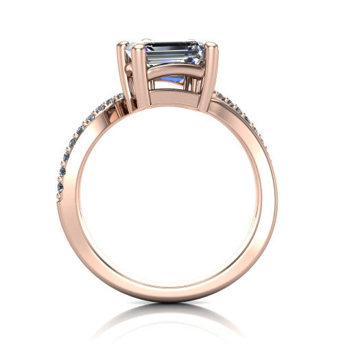 Julieta emerald three stone engagement ring in 14K Rose Gold, through-finger front profile showing the two-stone head and bypass split shank arms