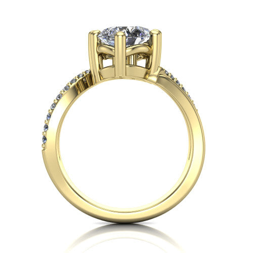 Julieta pear three stone engagement ring in 18K Yellow Gold, through-finger front profile showing the two-stone head and bypass split shank arms