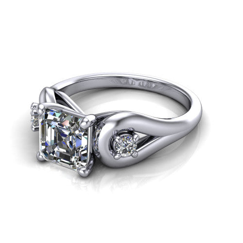 Imani square emerald three stone engagement ring in 18K White Gold, three-quarter perspective showing the step-cut square emerald center diamond flanked by two round side diamonds in square frames on bypass loop shoulders