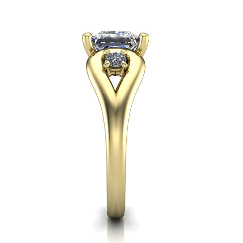 Imani princess three stone engagement ring in 18K Yellow Gold, side profile showing the bypass loop shoulders curving through the square side frames and slim polished band
