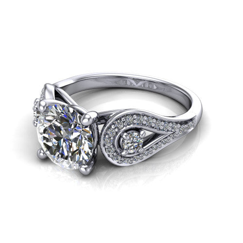 Jennifer round three stone engagement ring in 14K White Gold, three-quarter perspective showing the brilliant round center diamond flanked by two round side diamonds in pave teardrop frames on a pave split shank