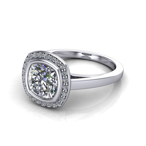 Rosie cushion halo bezel-set engagement ring in Platinum — three-quarter perspective showing the cushion-cut center diamond, pavé diamond halo, and slim high-polish shank